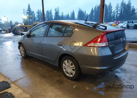 2011 Honda Insight from USA, damaged, VIN JHMZE2H32BS001076